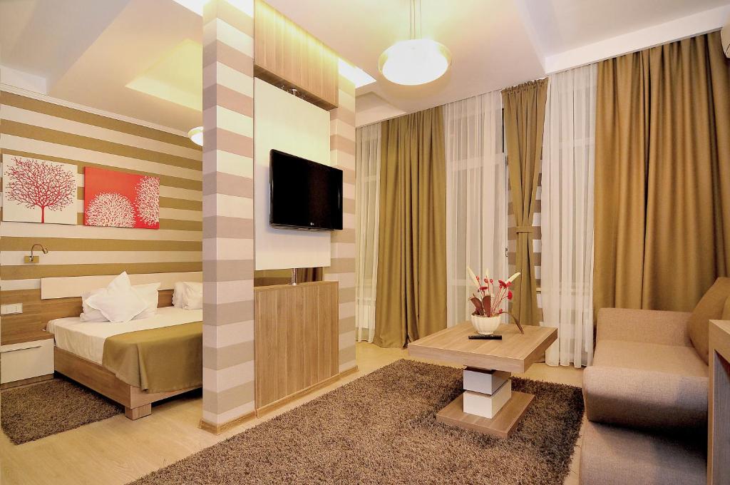 Postel nebo postele na pokoji v ubytování Hotel Confort
