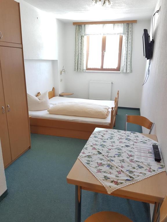 Postel nebo postele na pokoji v ubytování Gasthof Schützenwirt