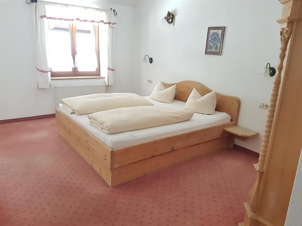 Postel nebo postele na pokoji v ubytování Gasthof Schützenwirt