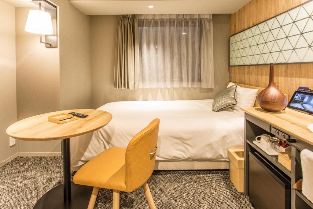 Cama ou camas em um quarto em Hotel Musse Ginza Meitetsu