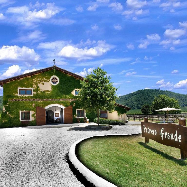 a building with a sign in front of it at Agriturismo Potrero Grande sul Lago di Martignano con spiaggia in Campagnano di Roma