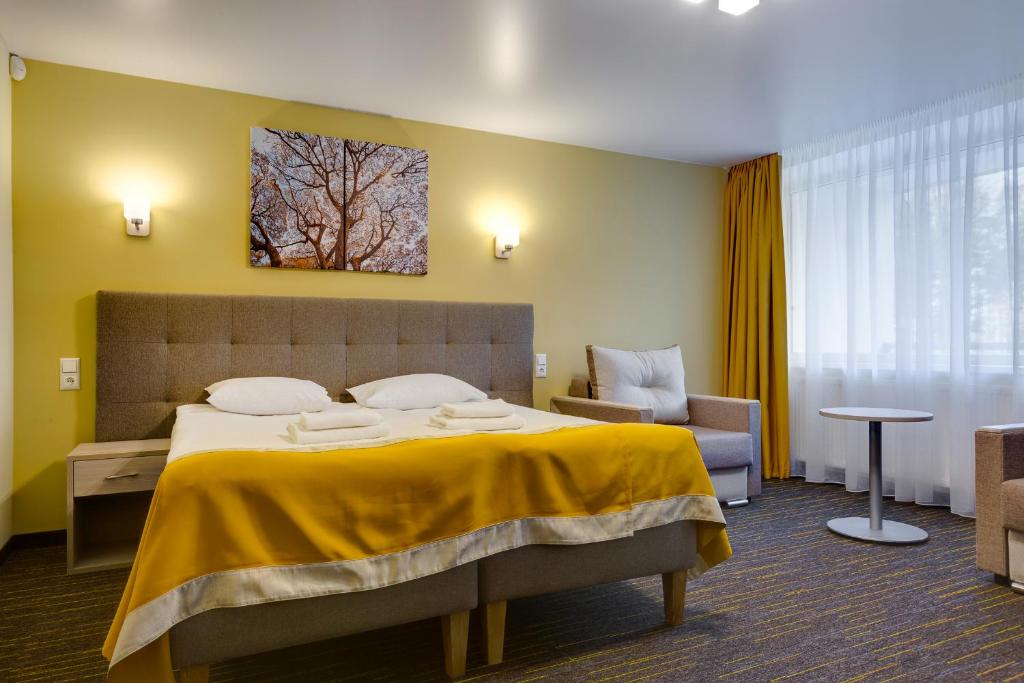 Postel nebo postele na pokoji v ubytování Liivarand Hotel