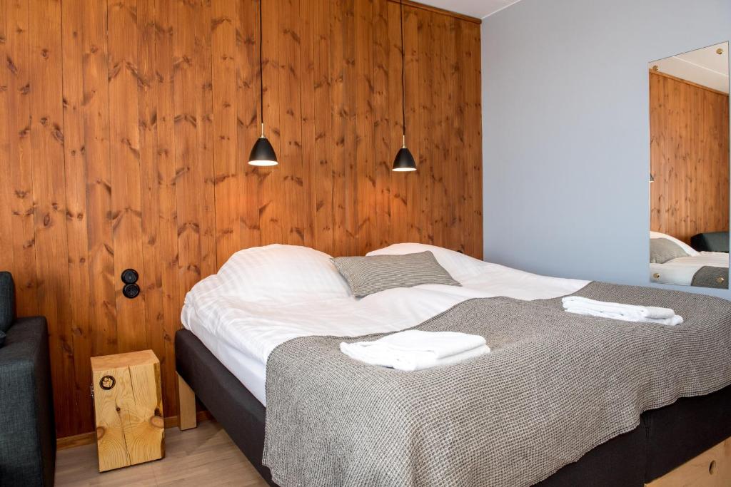 Postel nebo postele na pokoji v ubytování Bergshotellet
