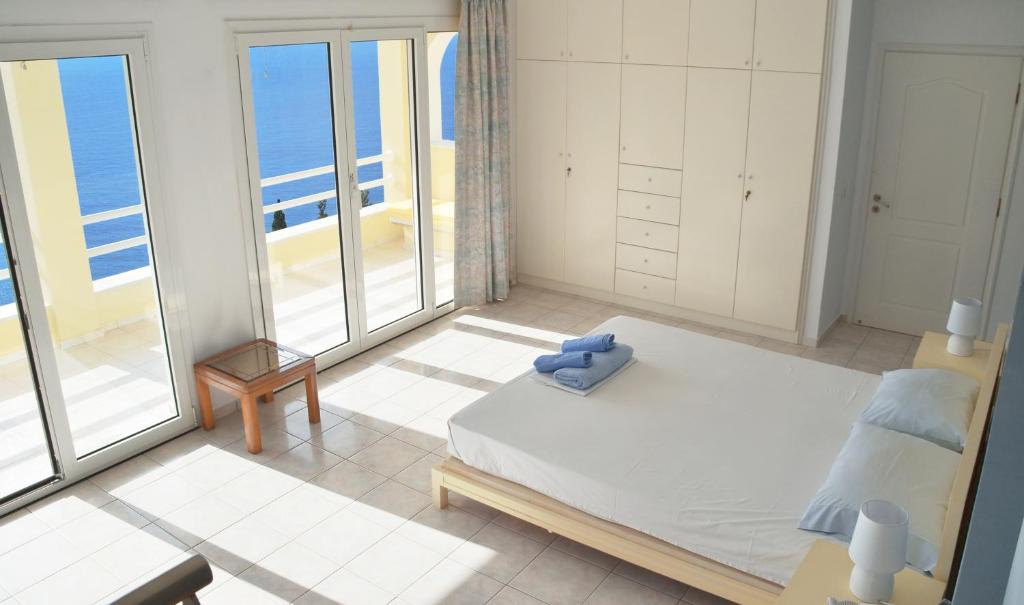 Postel nebo postele na pokoji v ubytování Villa Alibertini