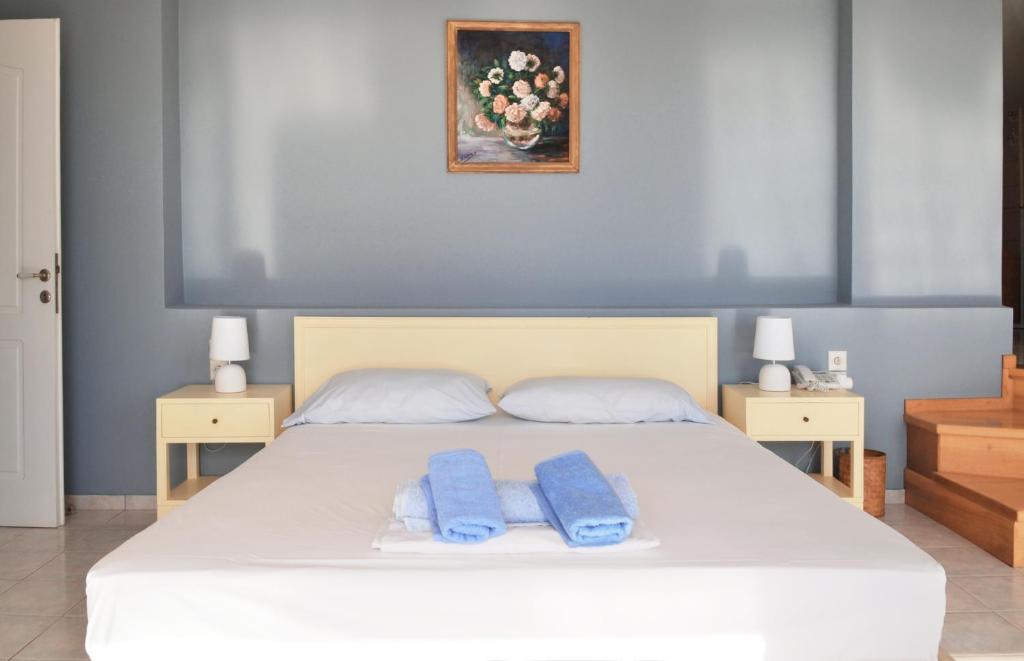 Postel nebo postele na pokoji v ubytování Villa Alibertini