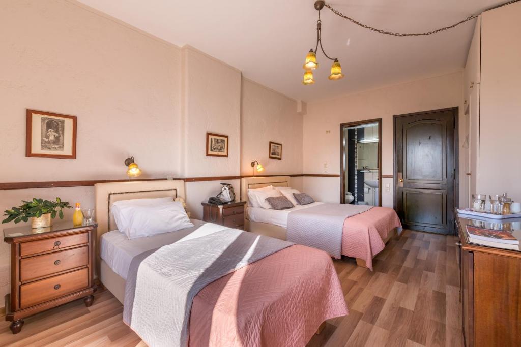 Postel nebo postele na pokoji v ubytování Jolly Hotel