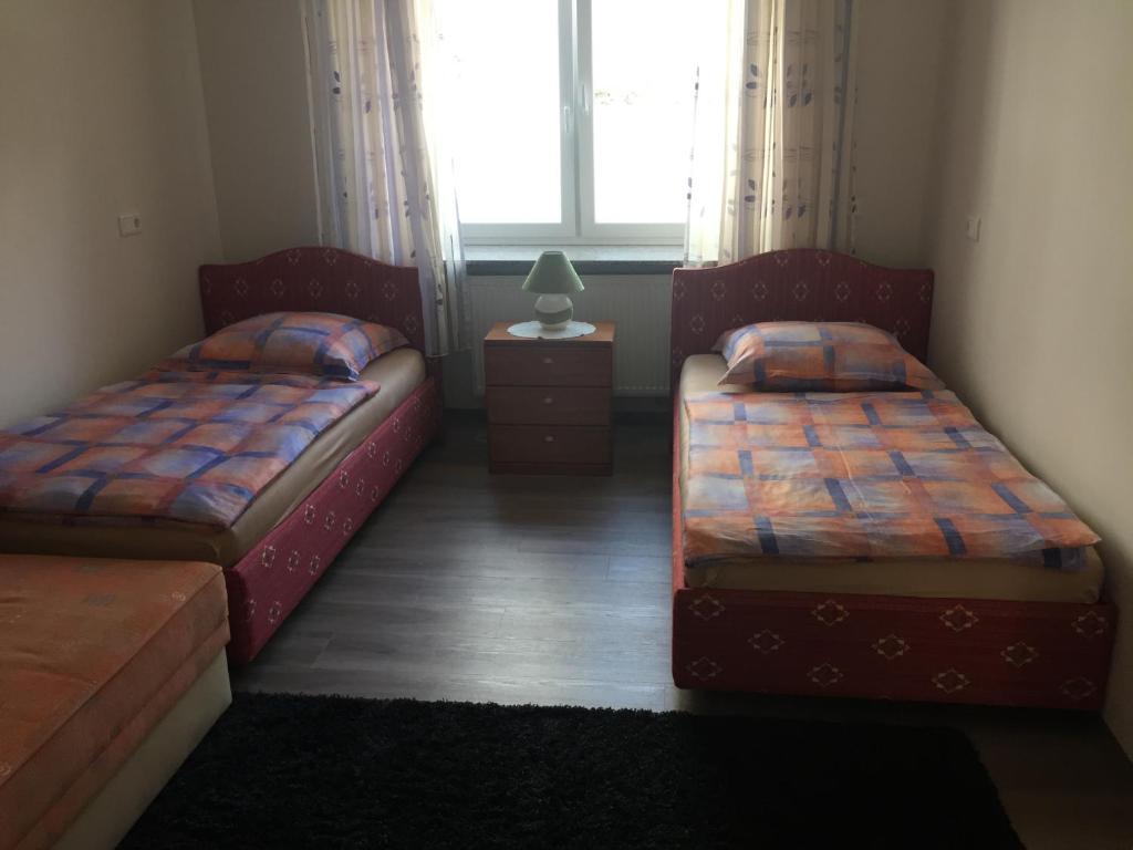 City-Apartment in Nurnberg tesisinde bir odada yatak veya yataklar
