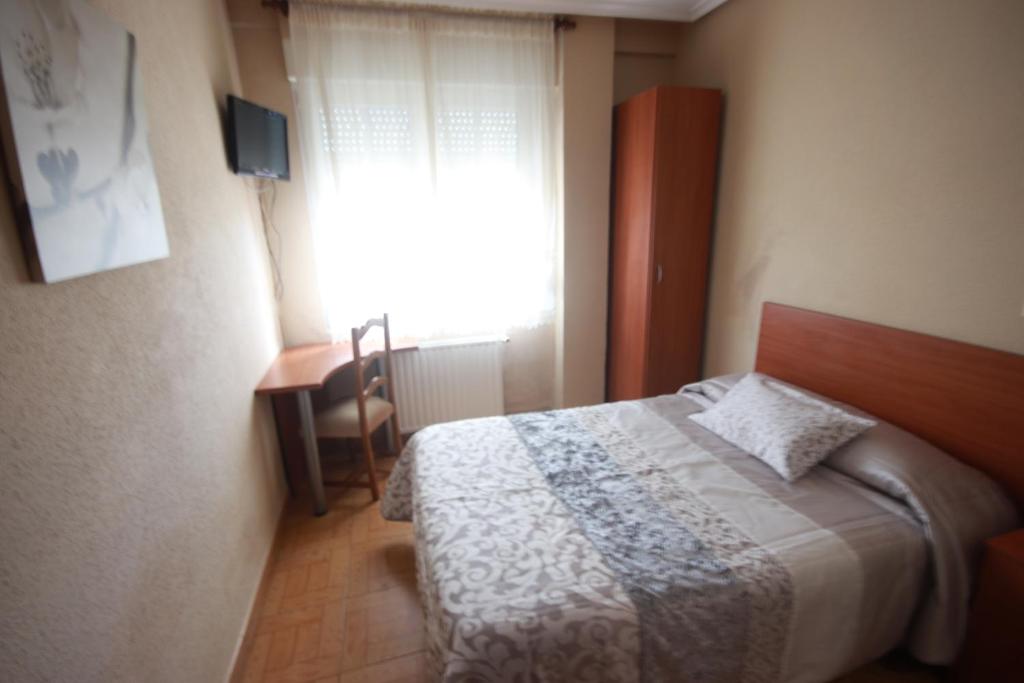 Postel nebo postele na pokoji v ubytování Tita sanpatiel