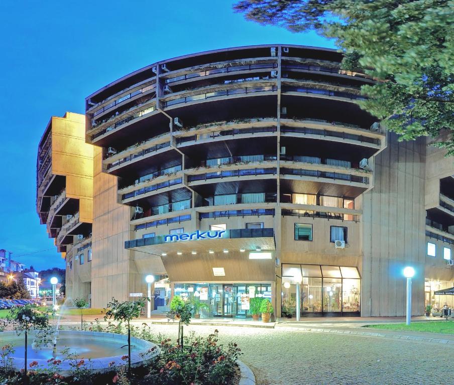 a large building with akritkritkritkritkrithospital at Medical and Spa Centre Merkur in Vrnjačka Banja