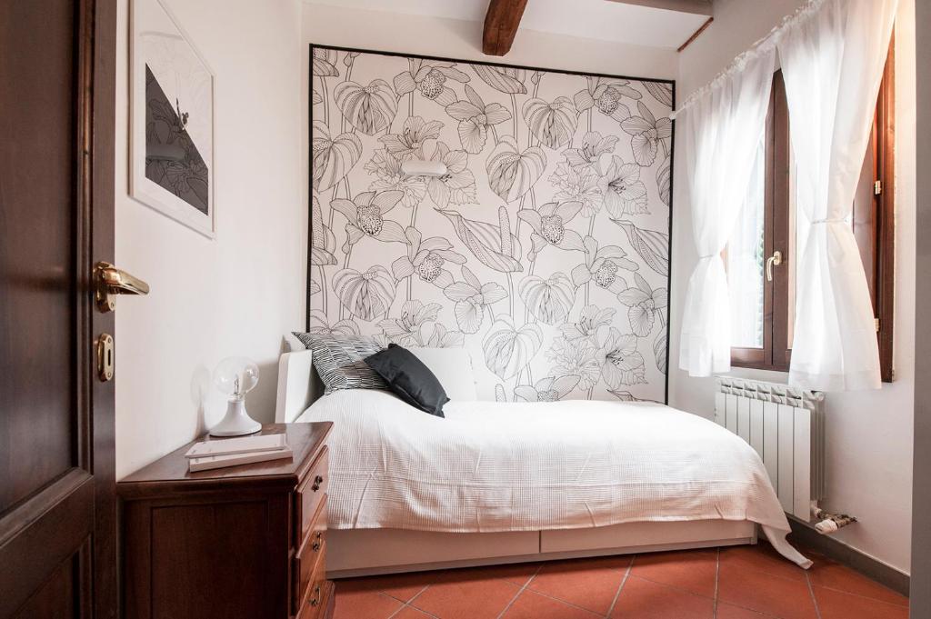 Posteľ alebo postele v izbe v ubytovaní Borgo Pinti Apartment