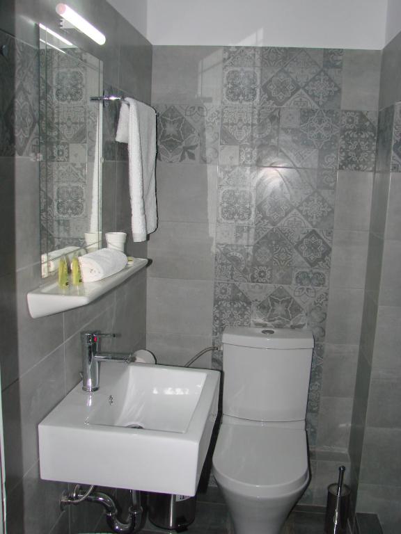 Koupelna v ubytování Nikolas Hotel