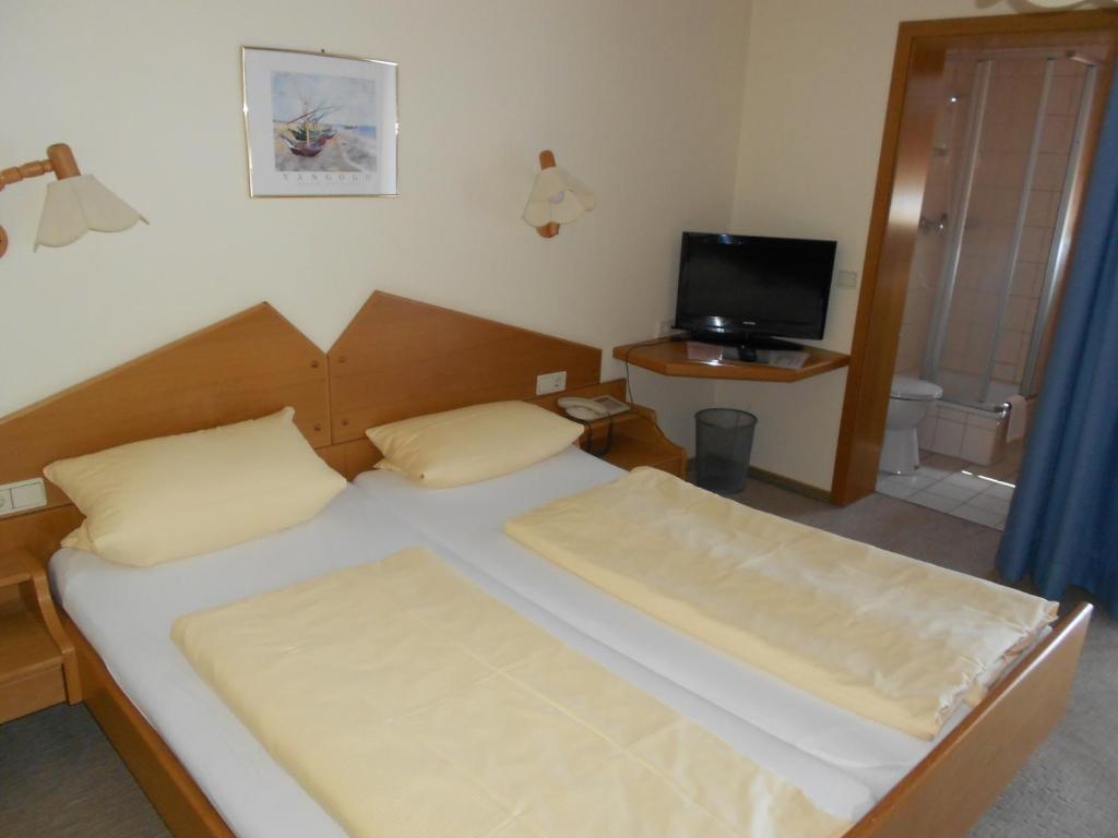Postel nebo postele na pokoji v ubytování Blick zum Maimont