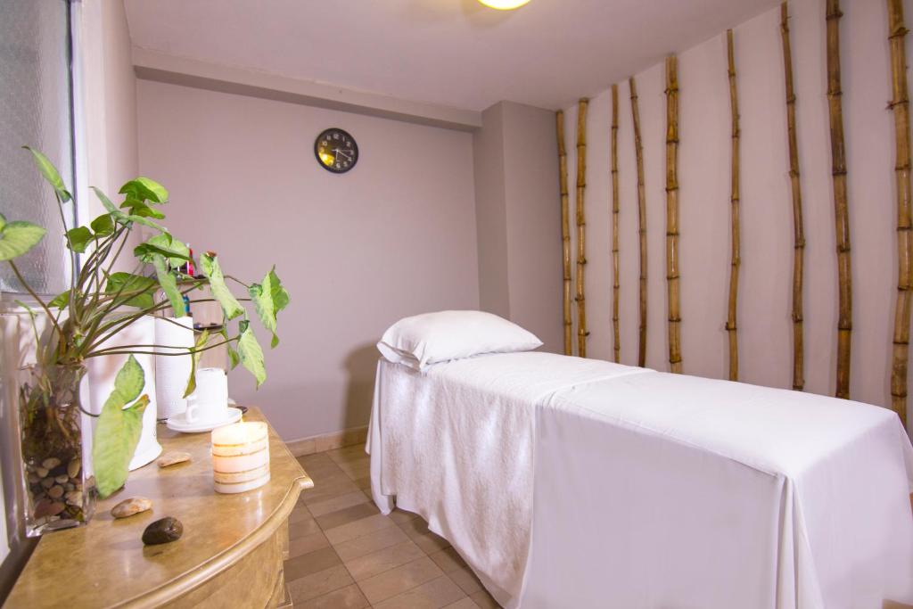 Postel nebo postele na pokoji v ubytování Hotel Libertador