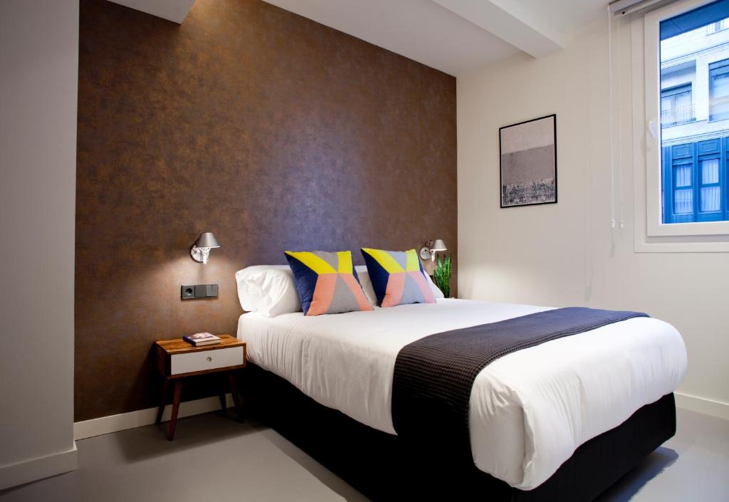 Postel nebo postele na pokoji v ubytování Bilbao Centric Apartments