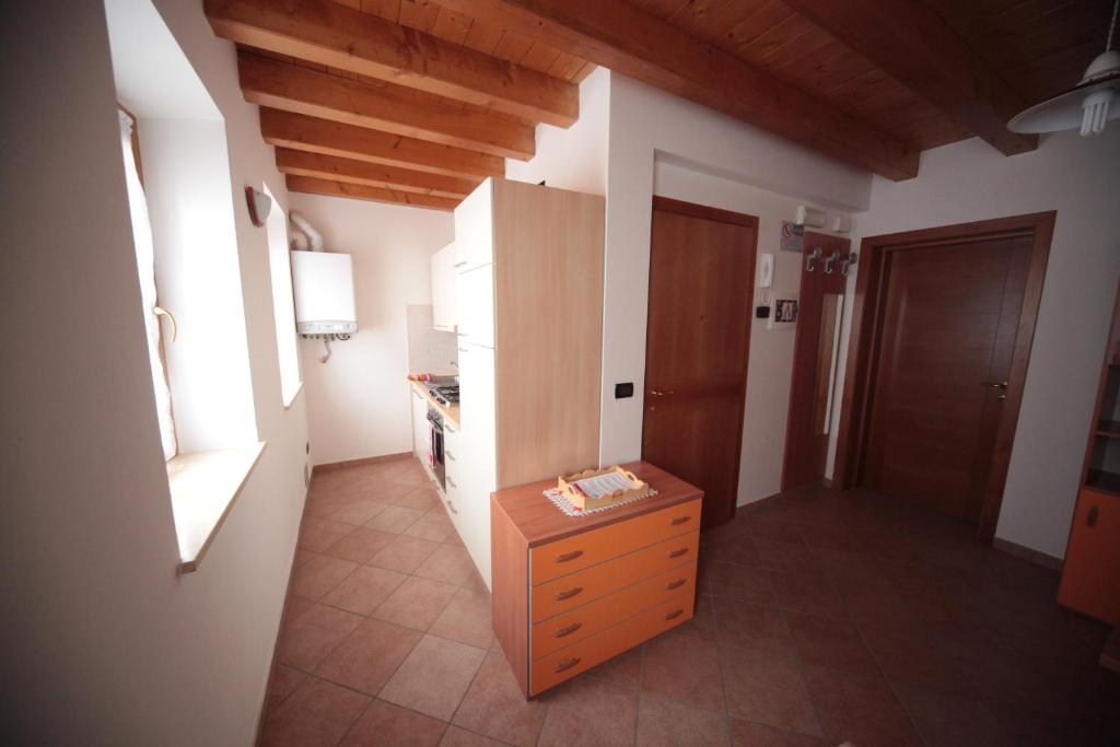 Postel nebo postele na pokoji v ubytování Albergo diffuso Valcellina e Val Vajont in Cimolais