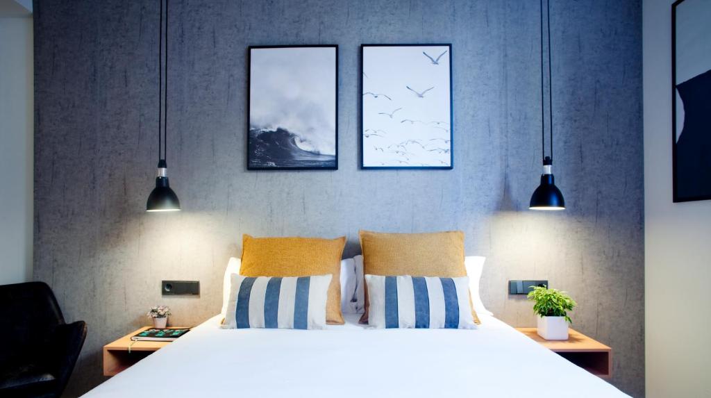 Postel nebo postele na pokoji v ubytování Bilbao Centric Apartments