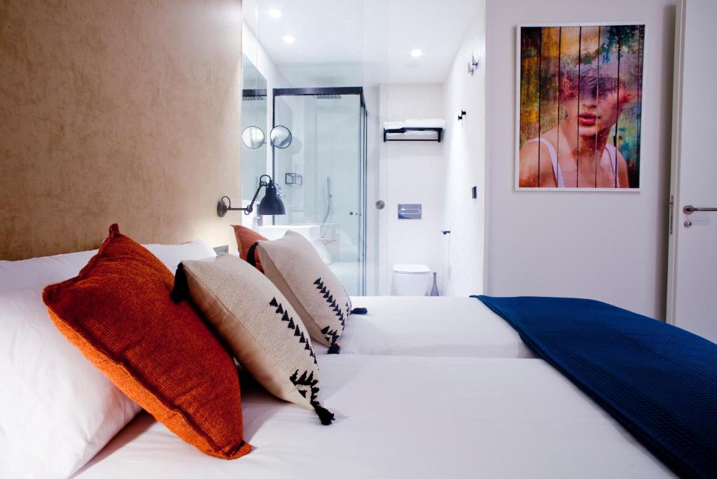 Postel nebo postele na pokoji v ubytování Bilbao Centric Apartments