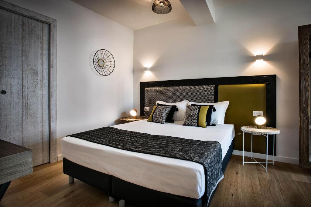 Letto o letti in una camera di Teku Sardinia Boutique Hotel