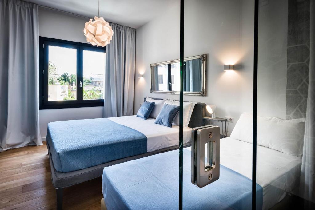Letto o letti in una camera di Teku Sardinia Boutique Hotel