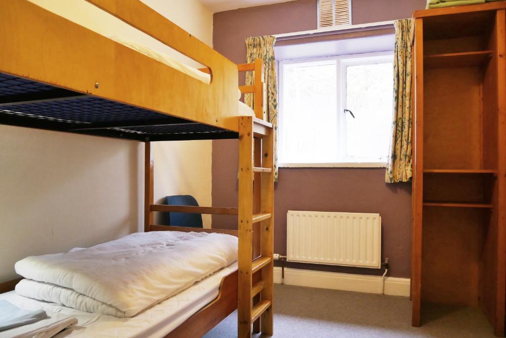 Postel nebo postele na pokoji v ubytování Elterwater Hostel