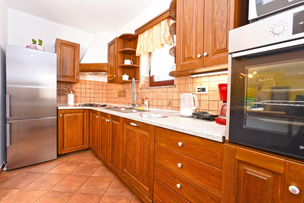 Kuchyň nebo kuchyňský kout v ubytování Apartment Modrusani 1561