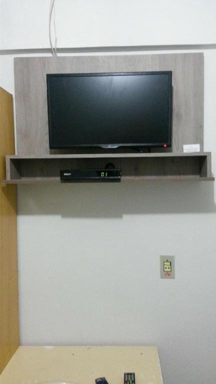 TV a/nebo společenská místnost v ubytování Rocha's Hotel