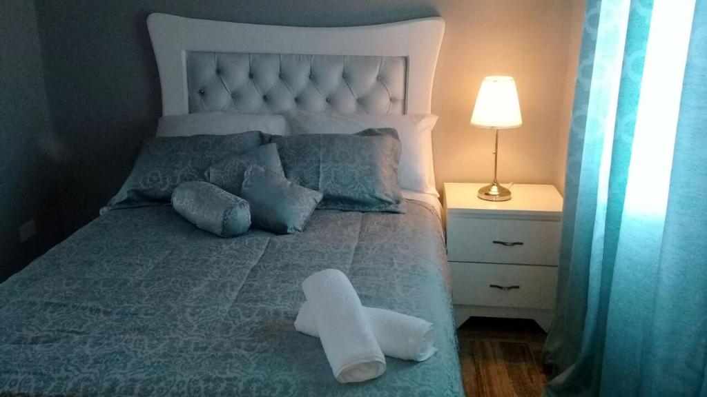 Postel nebo postele na pokoji v ubytování Tavalero Rooms