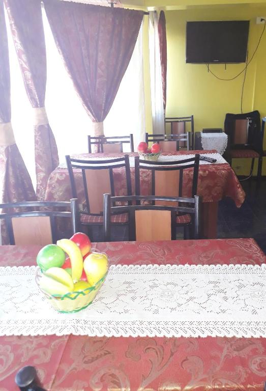 TV a/nebo společenská místnost v ubytování Hotel Aymara