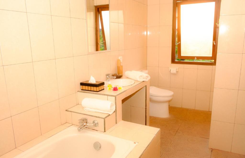 Koupelna v ubytování Semujan Bungalow