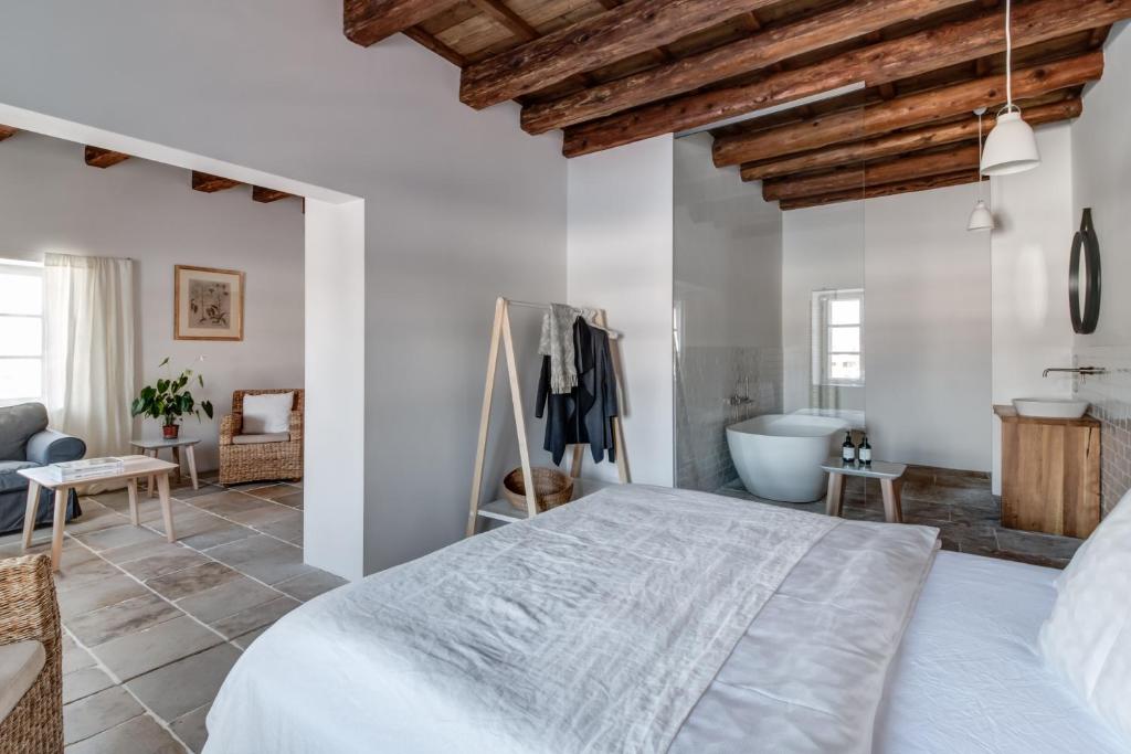 Postel nebo postele na pokoji v ubytování Boutique hotel Mezi plutky