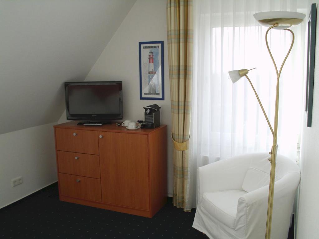 Postel nebo postele na pokoji v ubytování Haus Köbesine