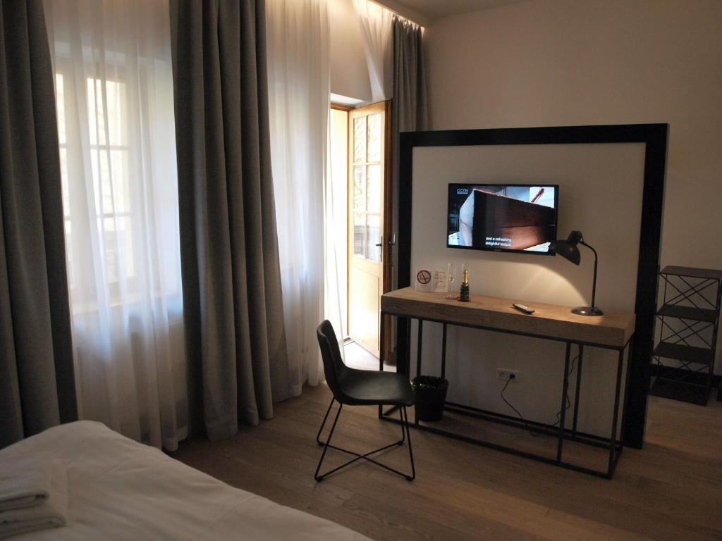 TV a/nebo společenská místnost v ubytování Antik Hotel Prague