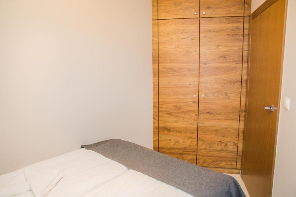 Postel nebo postele na pokoji v ubytování Family Homes - Apartamenty Gwiazda Morza