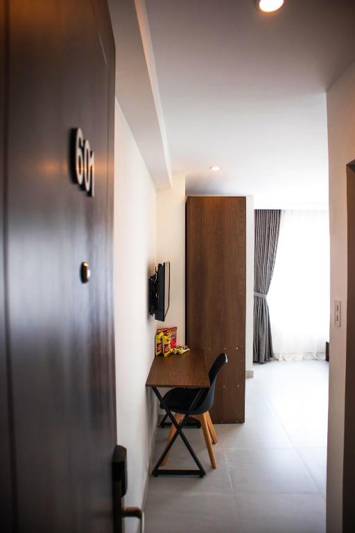 TV a/nebo společenská místnost v ubytování Robin Hotel Danang