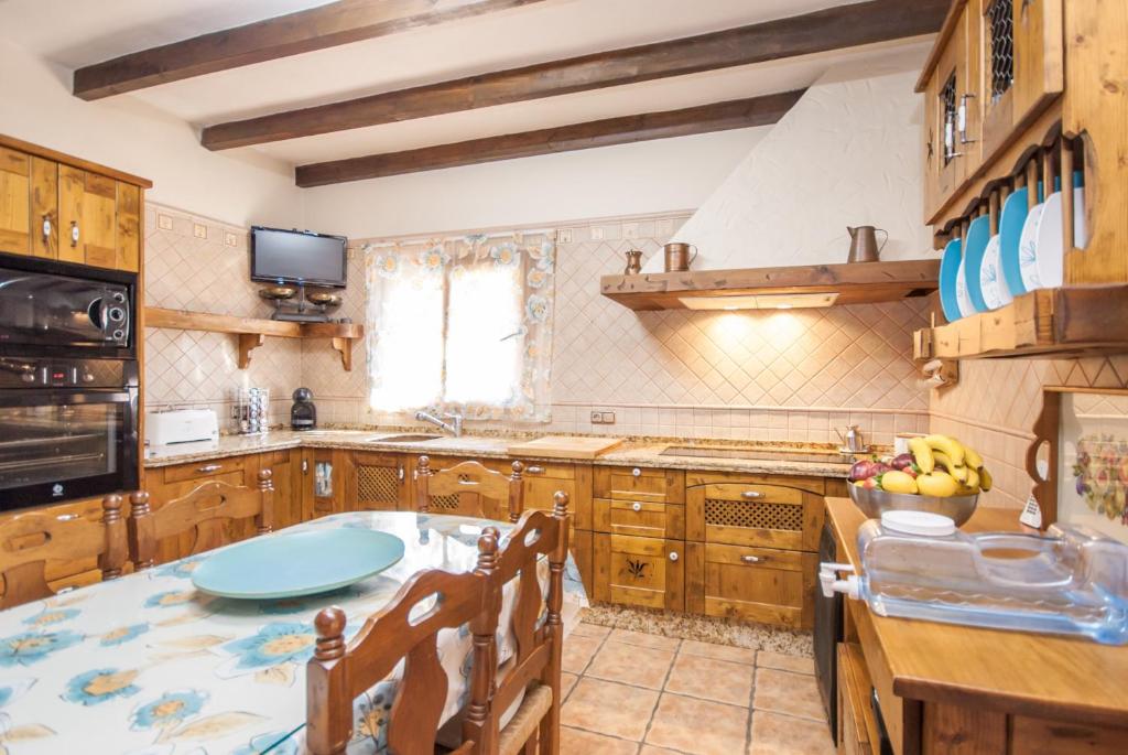 Kuchyňa alebo kuchynka v ubytovaní Cubo's Villa Family