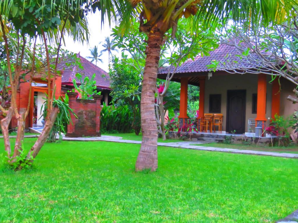 Zahrada ubytování Suka Sari Cottages