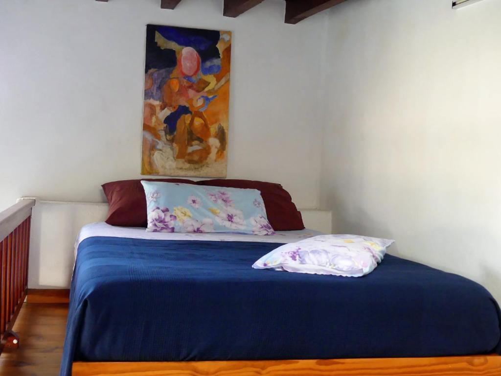 Postel nebo postele na pokoji v ubytování La Finca Uga