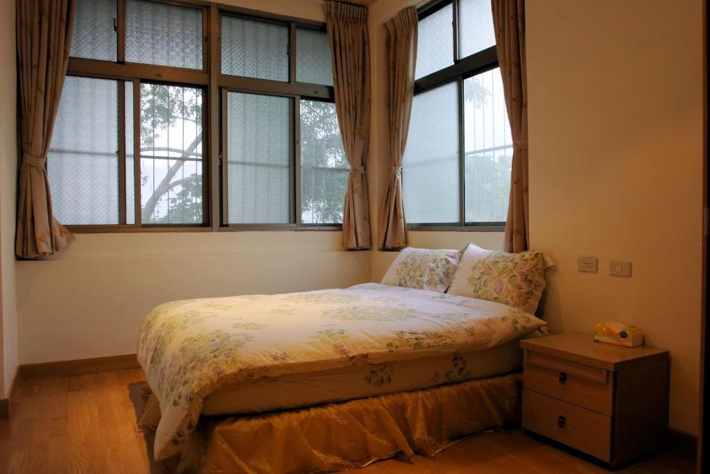 Postel nebo postele na pokoji v ubytování Erfen De Homestay