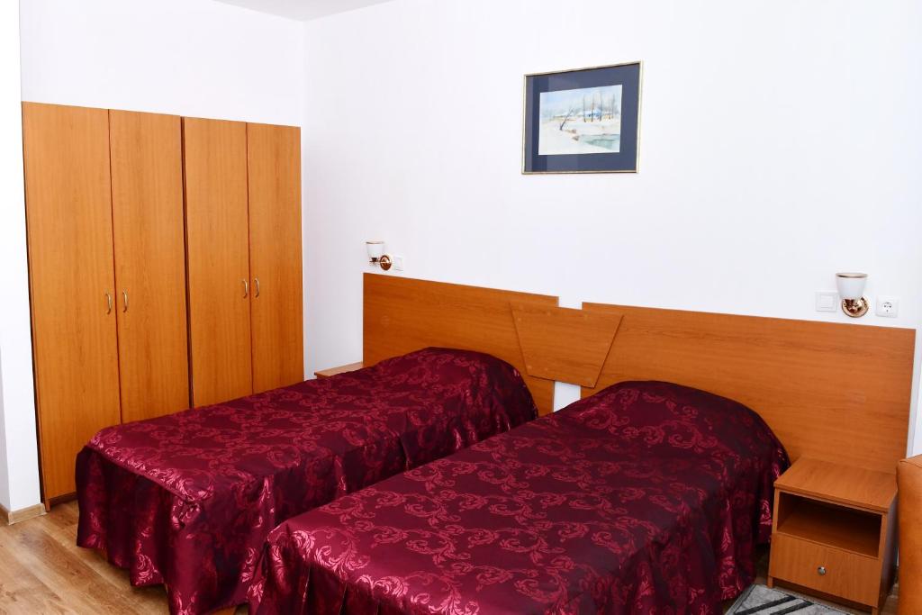 Postel nebo postele na pokoji v ubytování Hotel Select