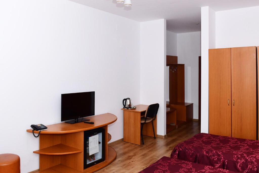 TV a/nebo společenská místnost v ubytování Hotel Select