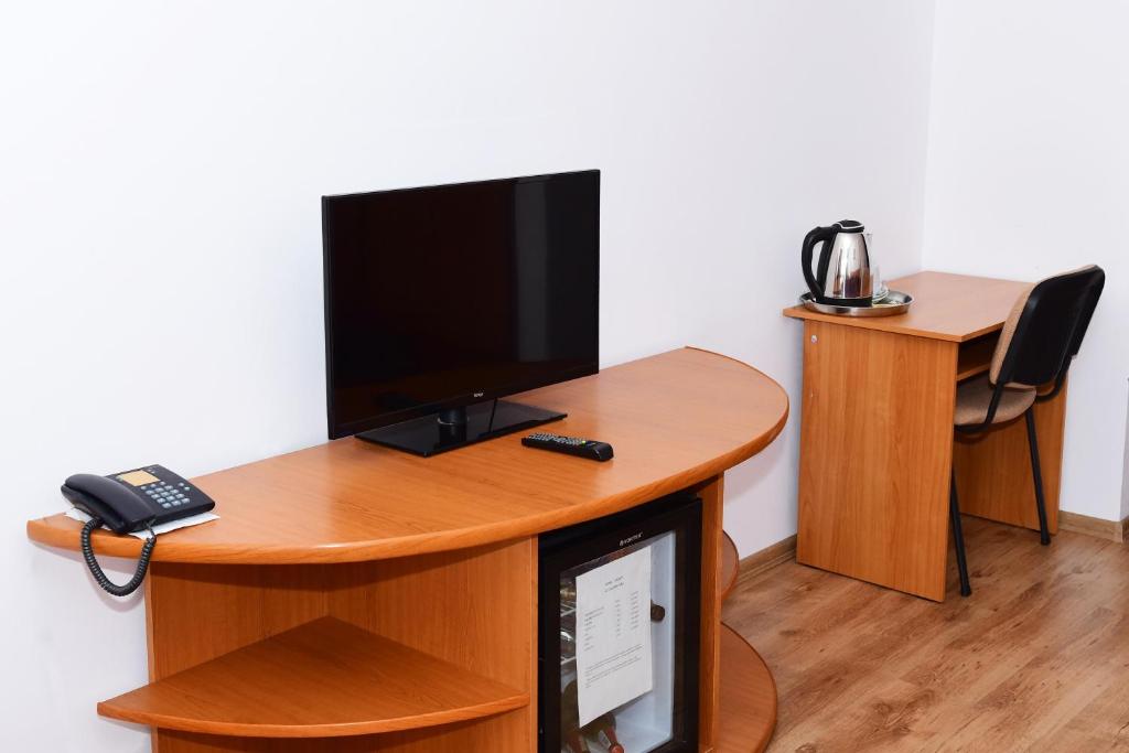 TV a/nebo společenská místnost v ubytování Hotel Select