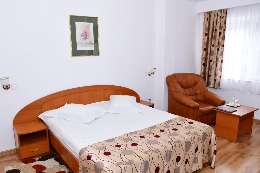 Postel nebo postele na pokoji v ubytování Hotel Select