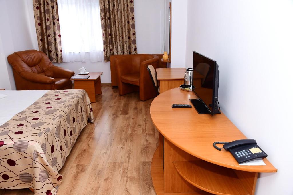 TV a/nebo společenská místnost v ubytování Hotel Select