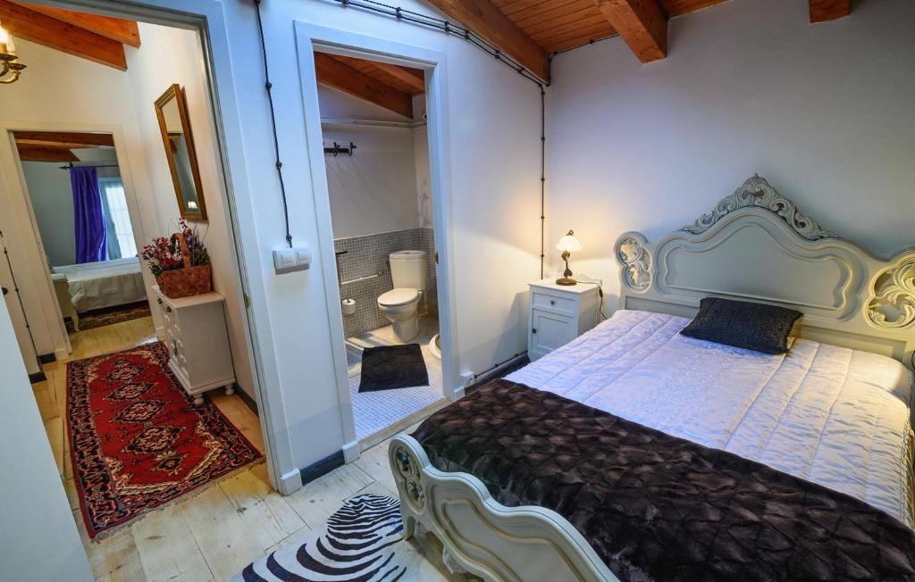 Posteľ alebo postele v izbe v ubytovaní casa do peso