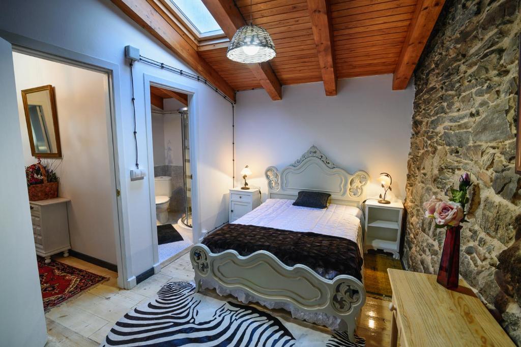 Posteľ alebo postele v izbe v ubytovaní casa do peso