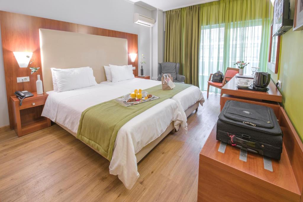 TV a/nebo společenská místnost v ubytování Polis Grand Hotel