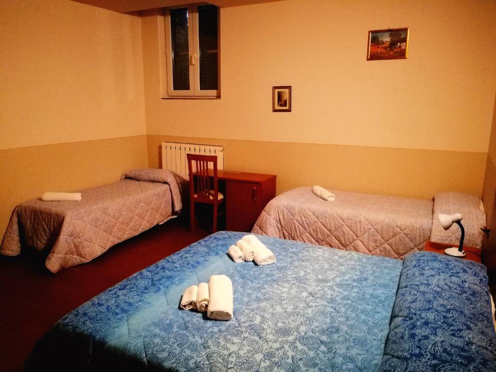 Postel nebo postele na pokoji v ubytování Agriturismo Longetti