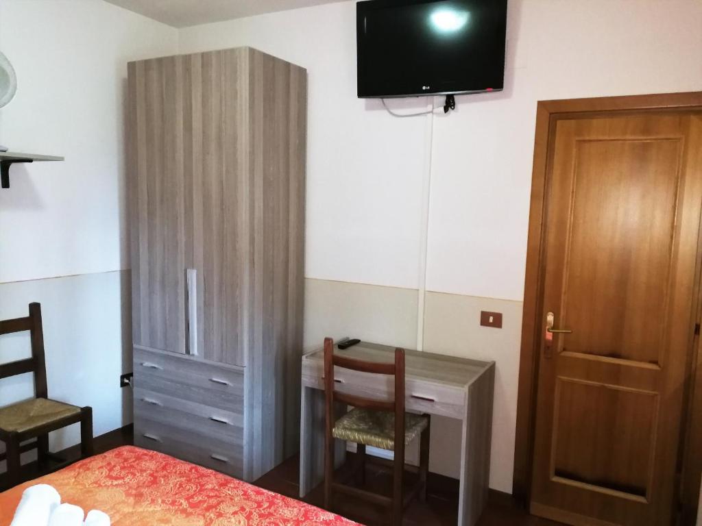 TV a/nebo společenská místnost v ubytování Agriturismo Longetti