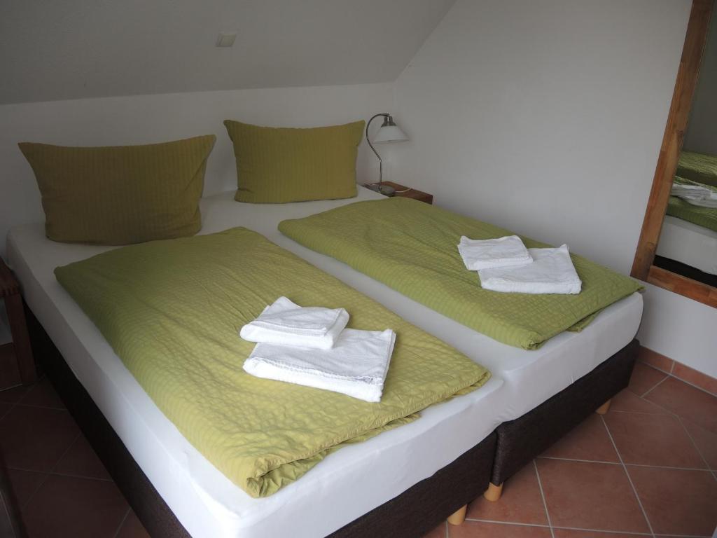 Postel nebo postele na pokoji v ubytování Usedom Suites Ückeritz