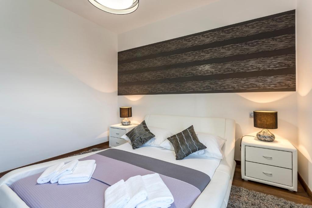 Posteľ alebo postele v izbe v ubytovaní Sea Pearl Luxury Apartment